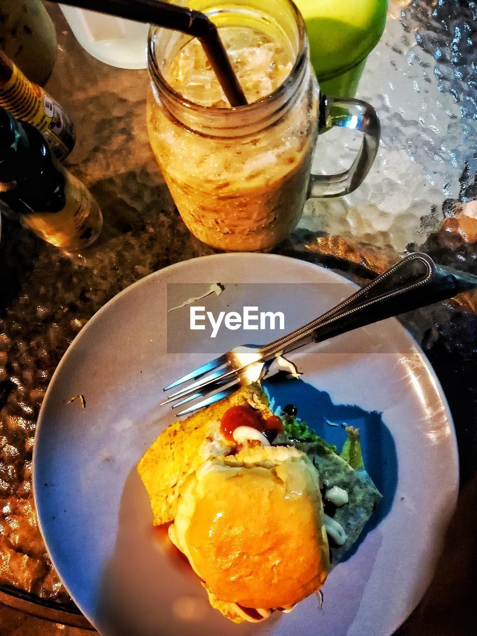 HIGH ANGLE VIEW OF ICE CREAM IN GLASS ON TABLE