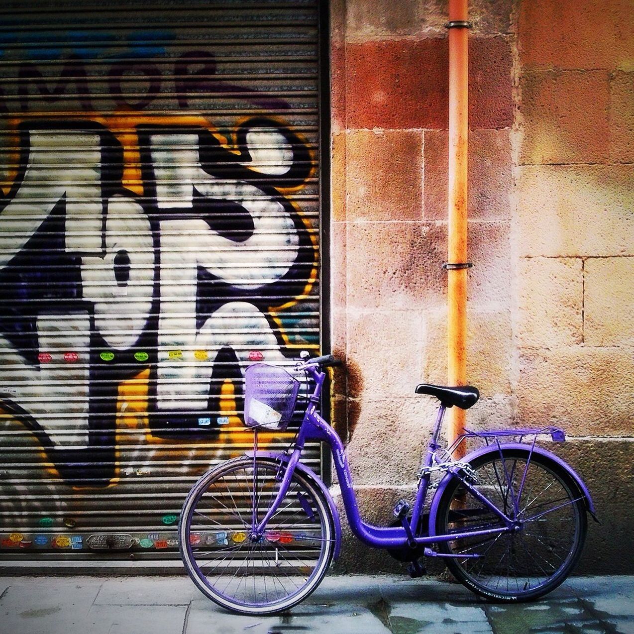 Bicycle leaning against store