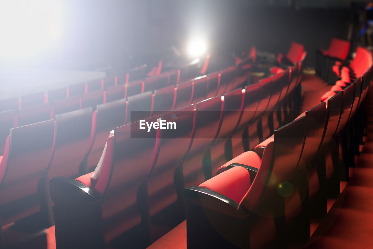 View of empty chairs in movie theater