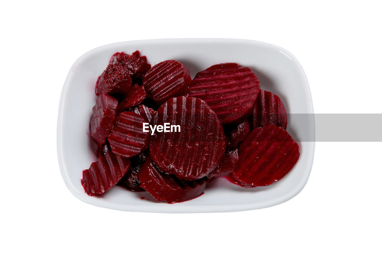 CLOSE-UP OF RASPBERRIES IN PLATE