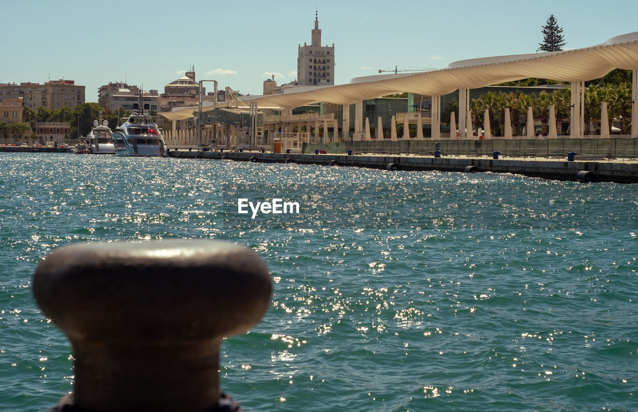 VIEW OF BUILDING BY SEA