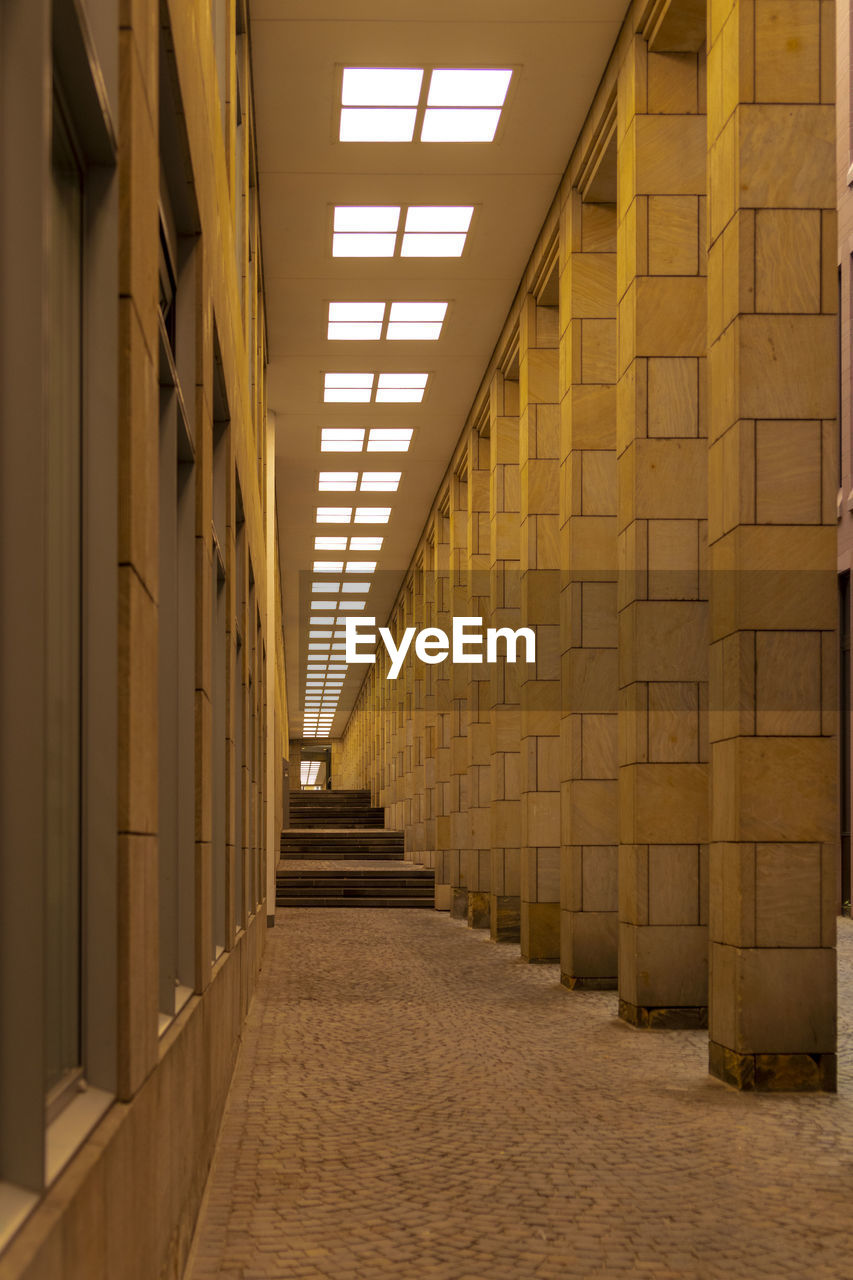 Illuminated corridor of building