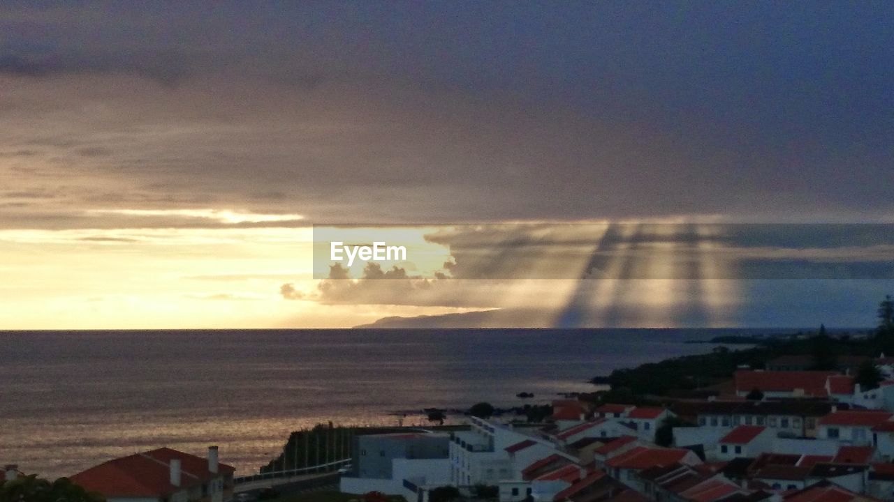 VIEW OF SEA AT SUNSET