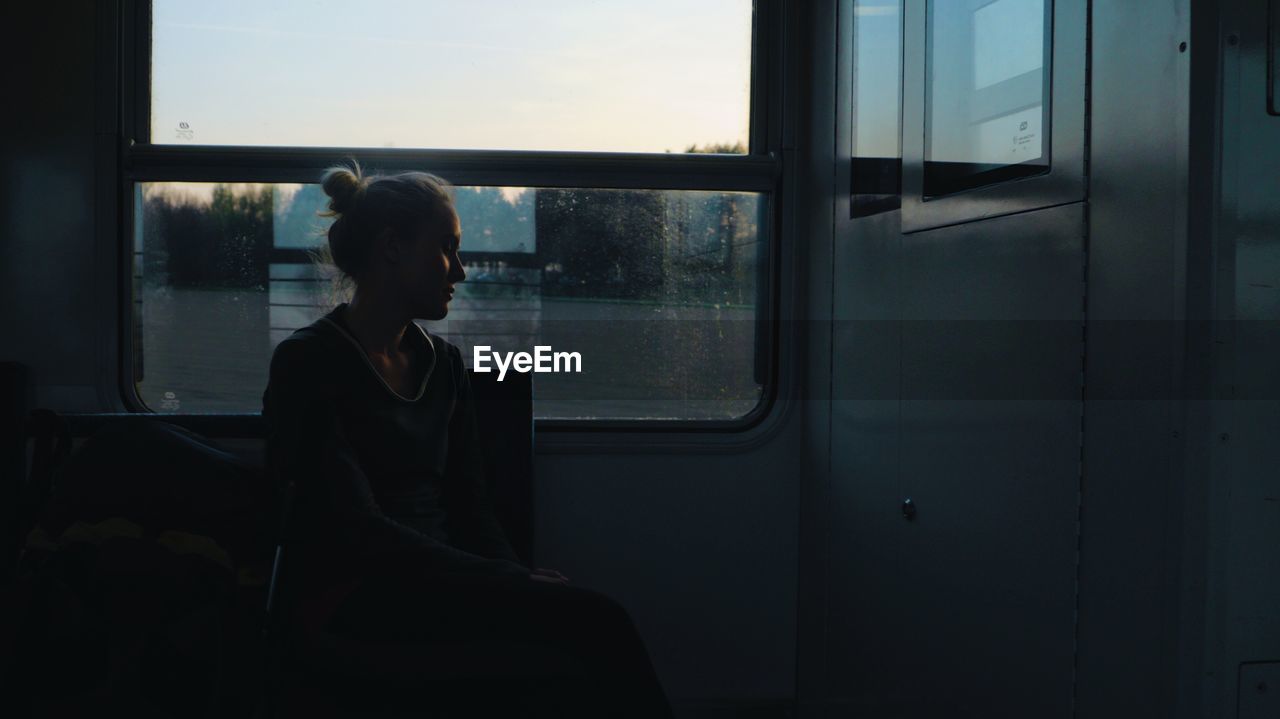 Woman traveling in train