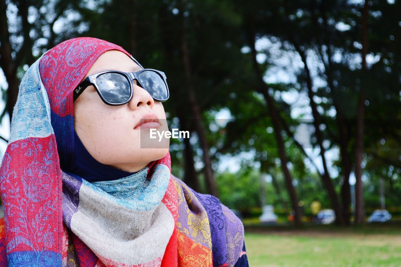 Close-up of woman wearing sunglasses