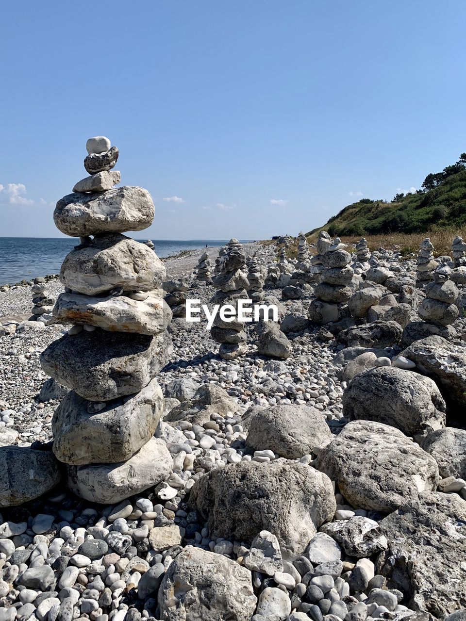 STACK OF STONES ON BEACH