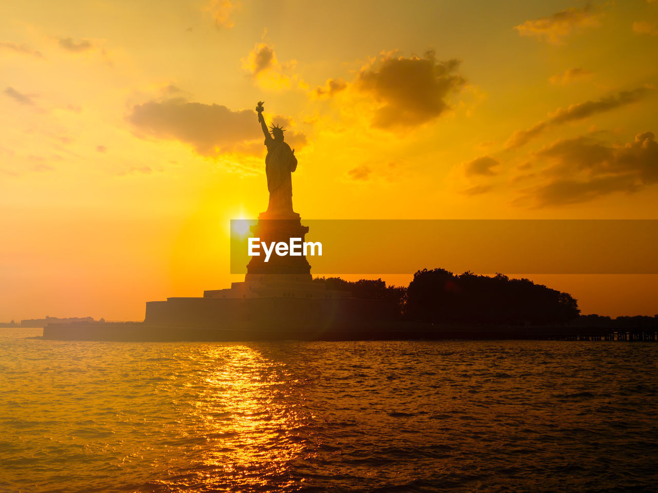 Statue of liberty at sunset