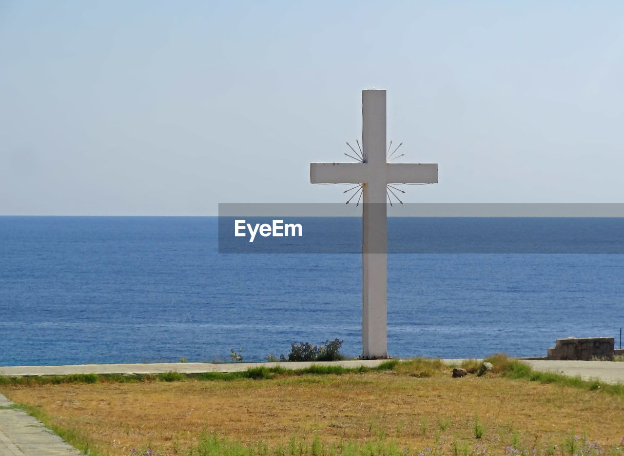 Big cross with athos sea in the background
