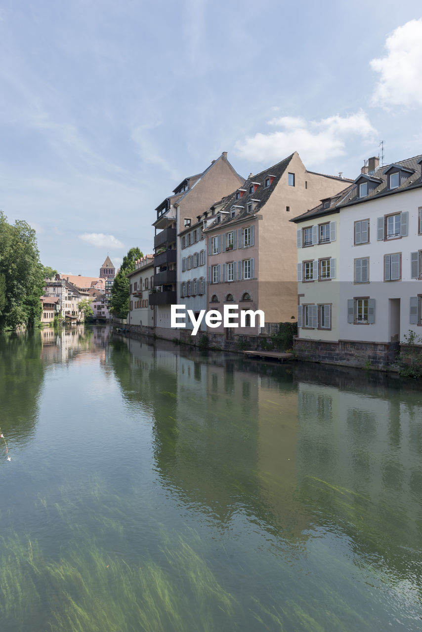 HOUSES IN CITY AGAINST SKY