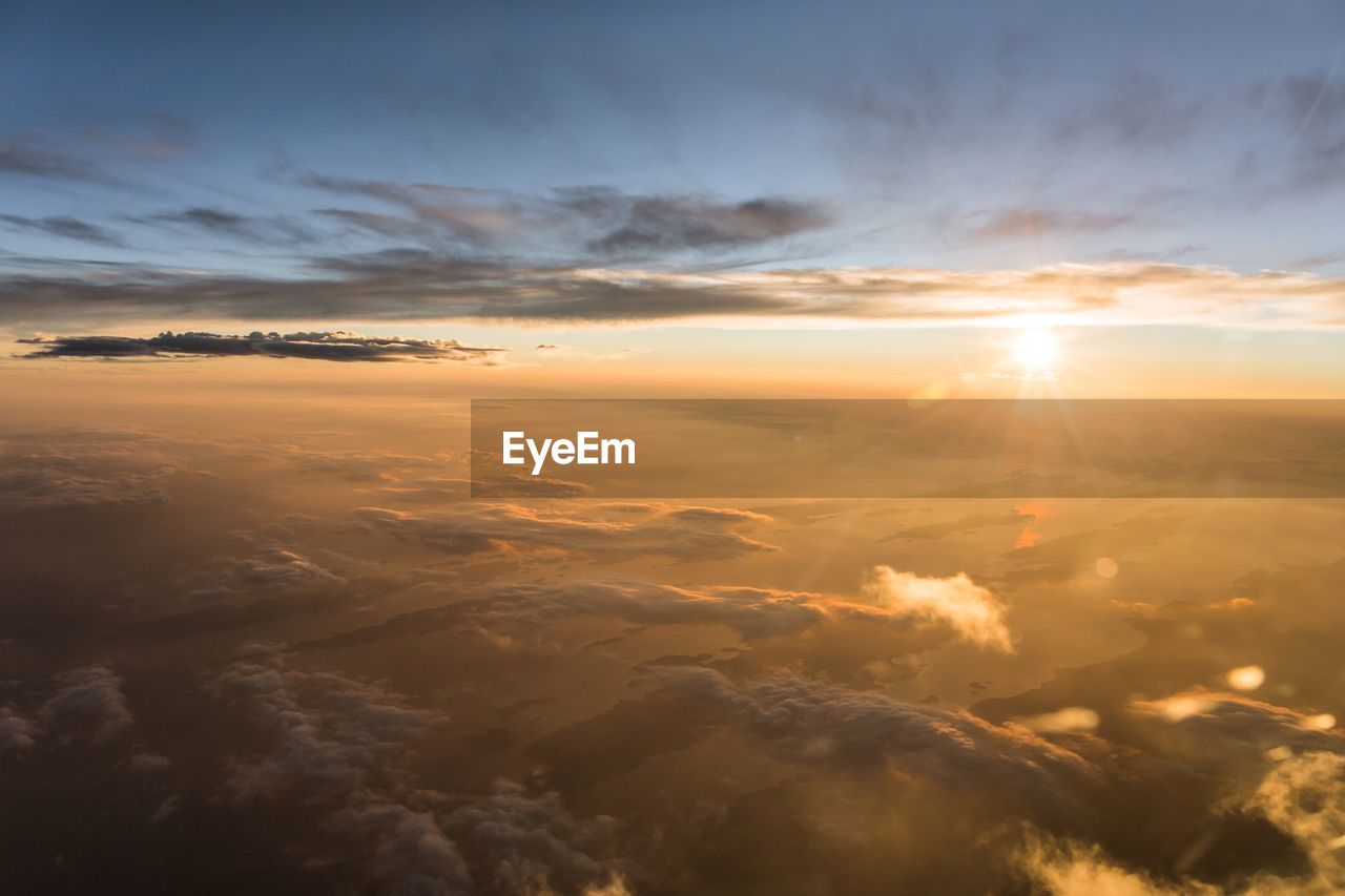 Aerial view of landscape during sunset