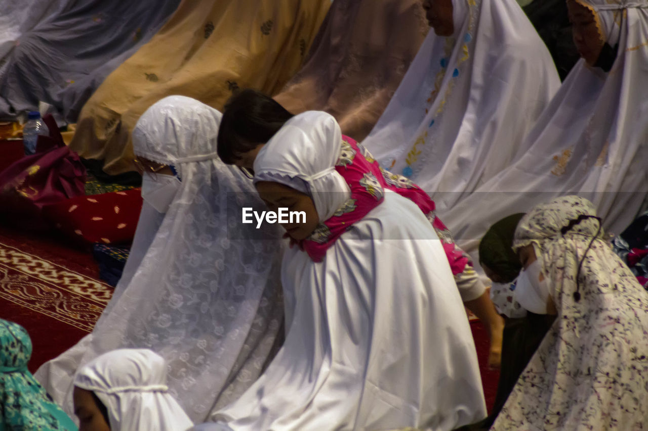 religion, belief, traditional clothing, spirituality, clothing, person, tradition, celebration, adult, women, praying, event, men, temple
