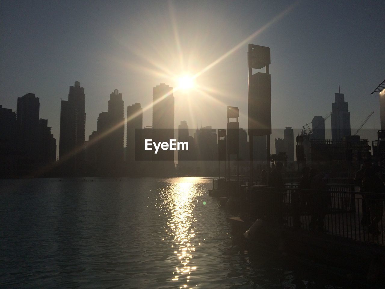 Sea and buildings during sunny day