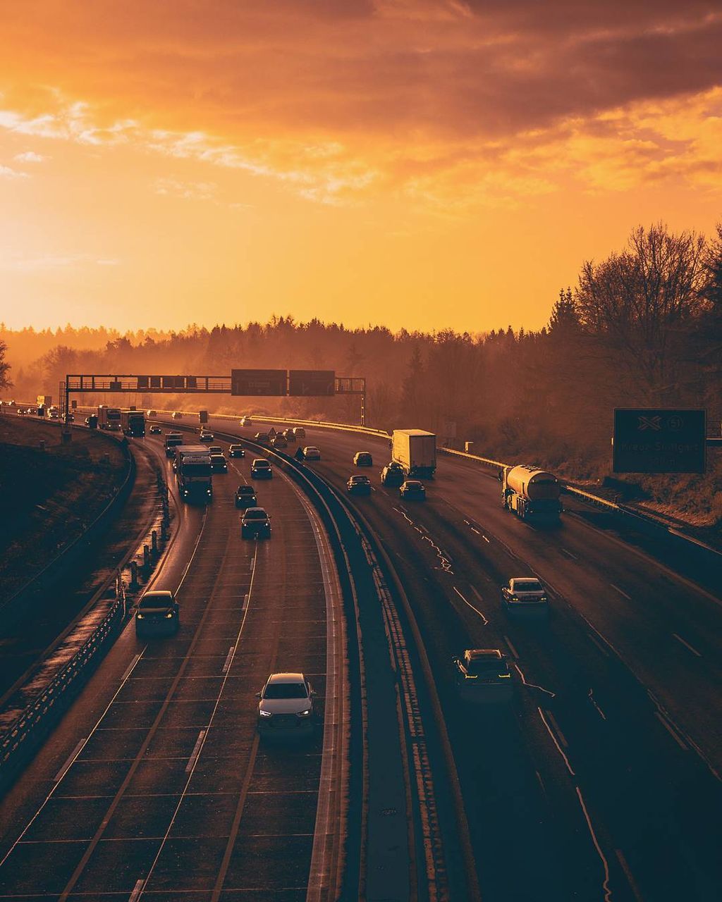 High angle view of highway in city during sunset