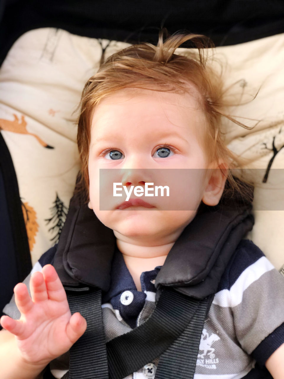 PORTRAIT OF CUTE BABY GIRL AT HOME