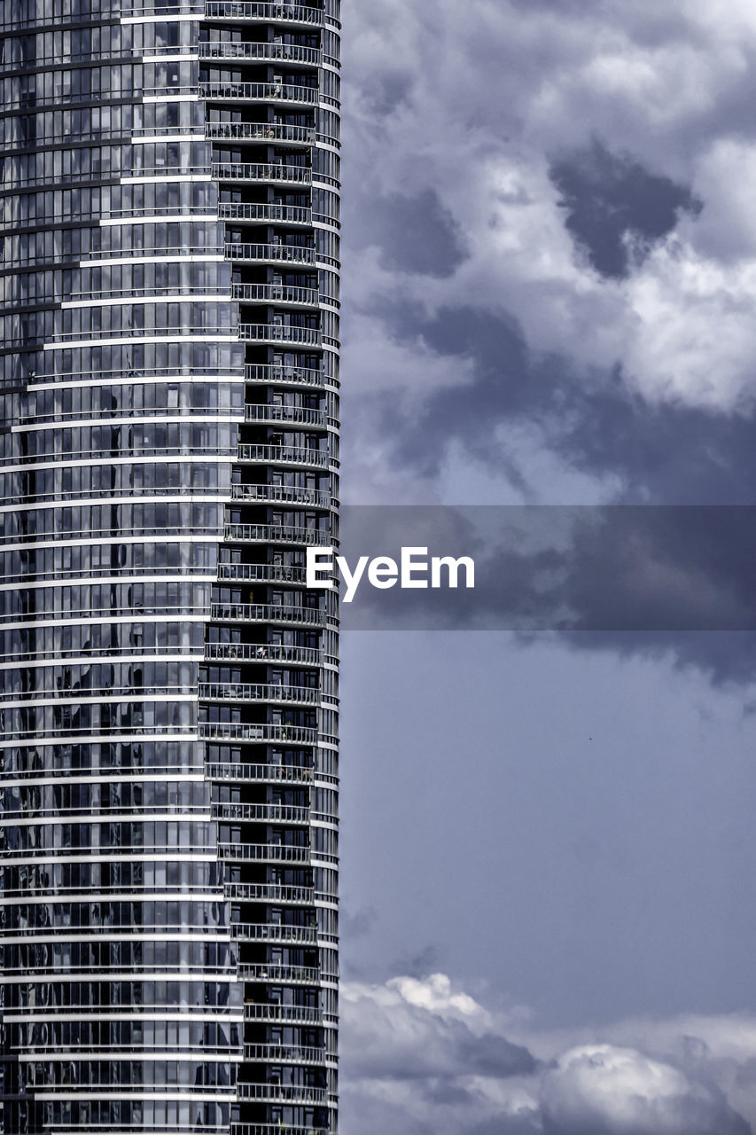 LOW ANGLE VIEW OF BUILDINGS AGAINST SKY