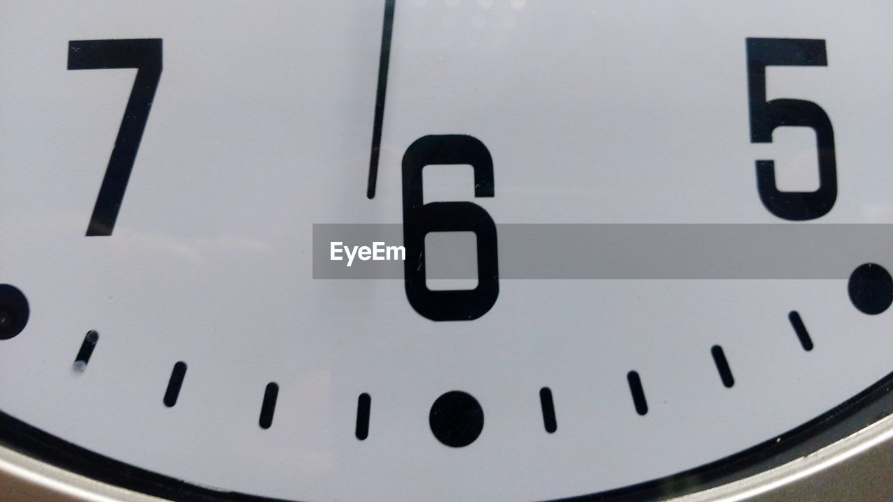 Close-up of numbers on clock