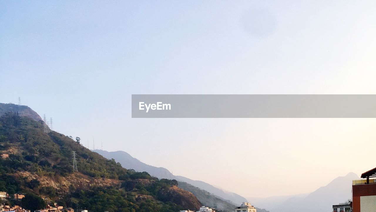 MOUNTAIN RANGE AGAINST CLEAR SKY