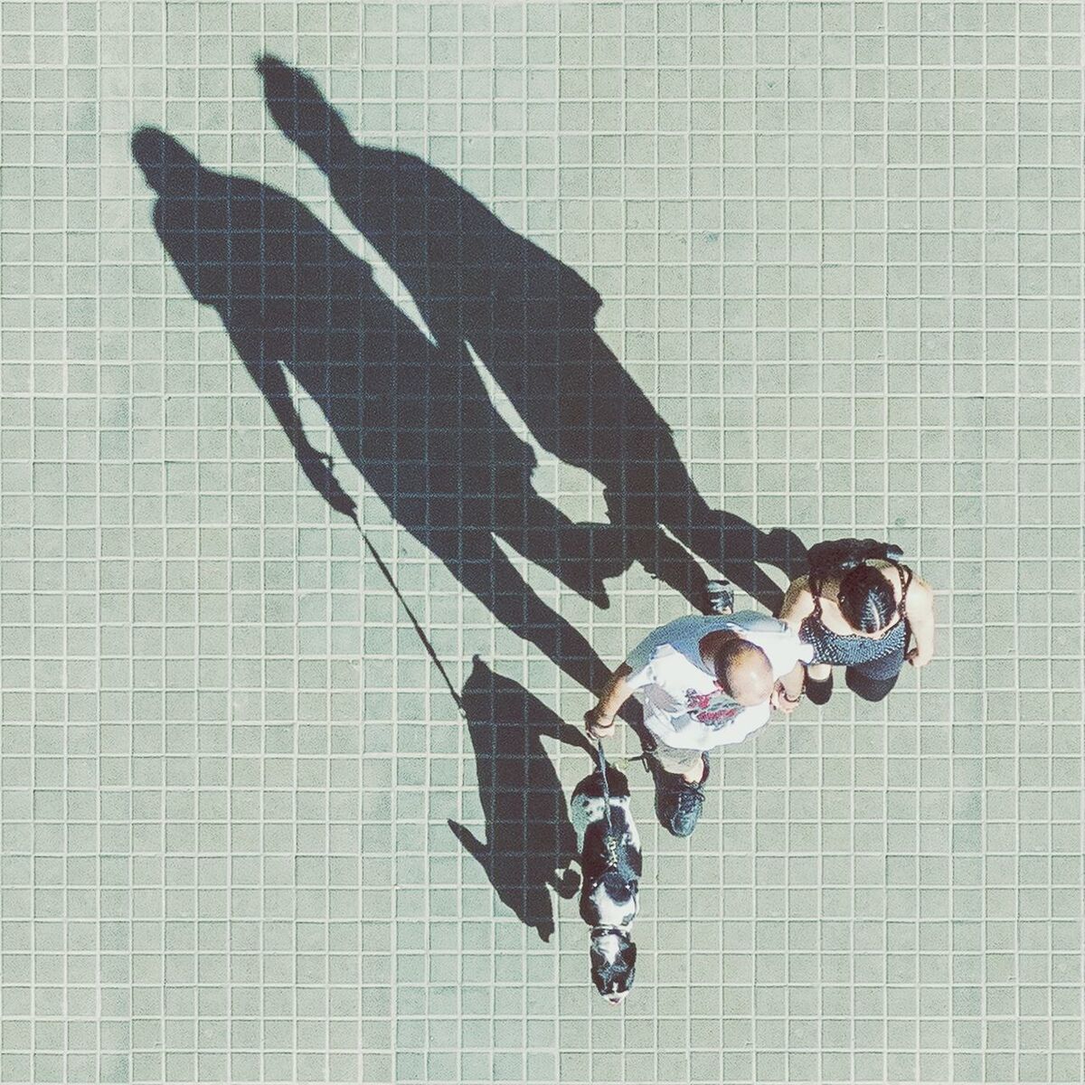 CLOSE-UP OF WOMAN STANDING ON WALL