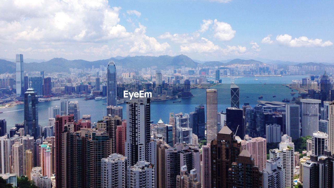 High angle view of modern buildings by river