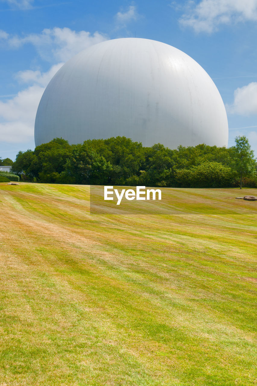 SCENIC VIEW OF LAND AND TREES AGAINST SKY