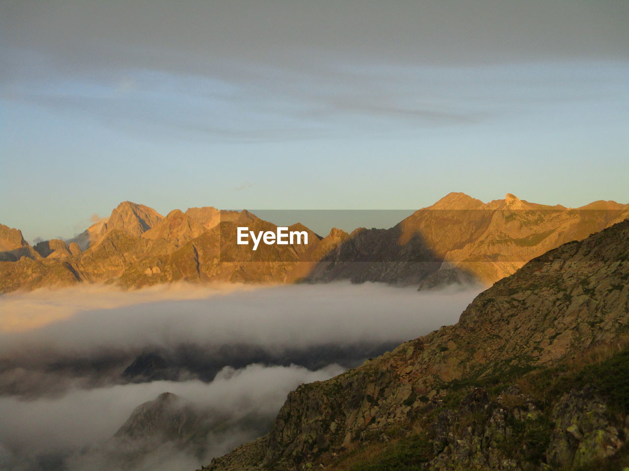 Scenic view of mountains against sky