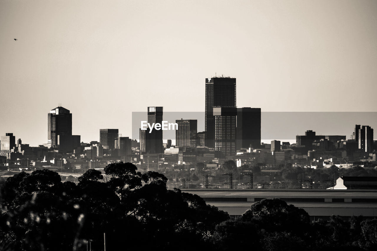 VIEW OF CITYSCAPE AGAINST SKY