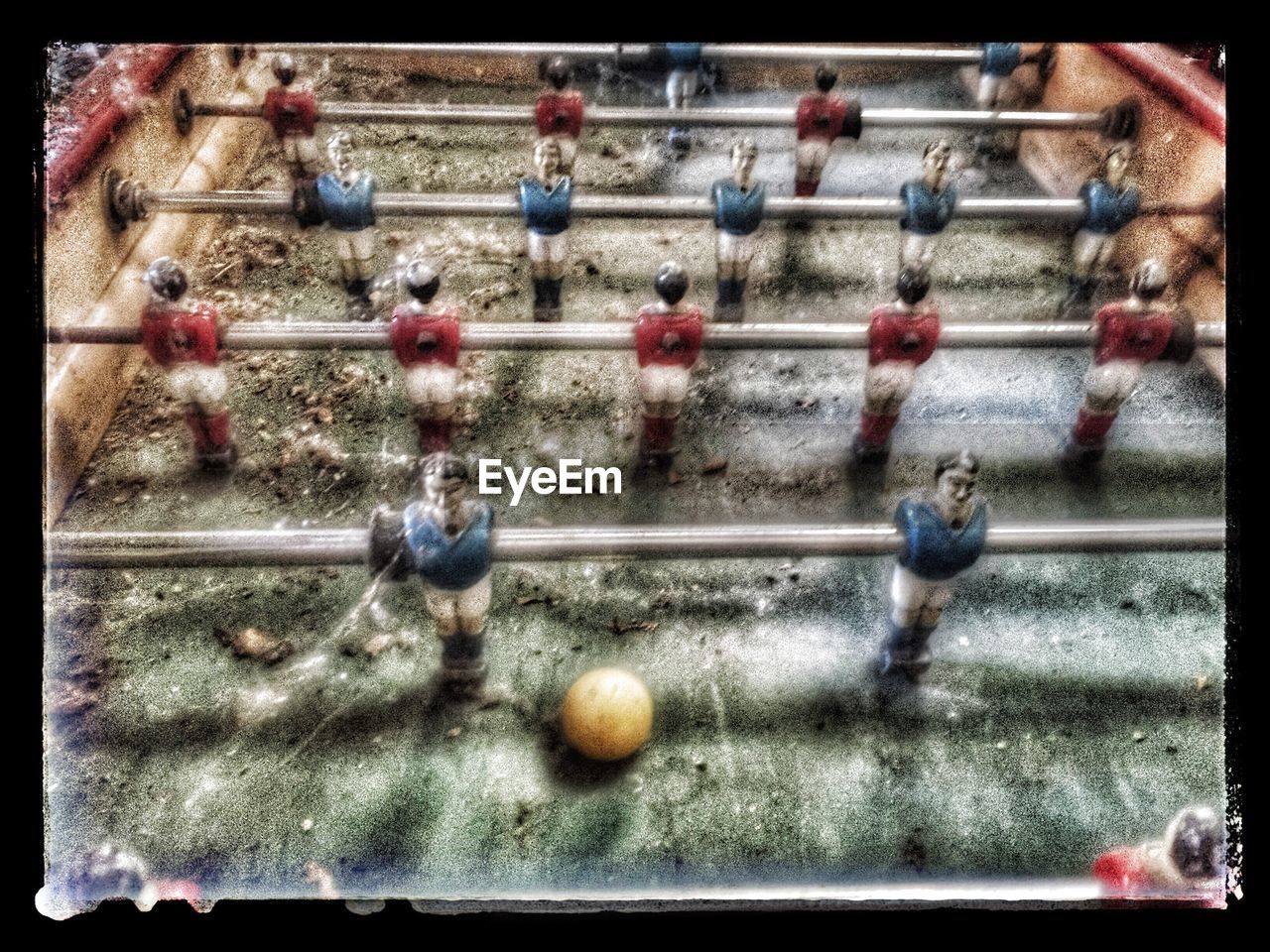 MEN IN MARKET STALL