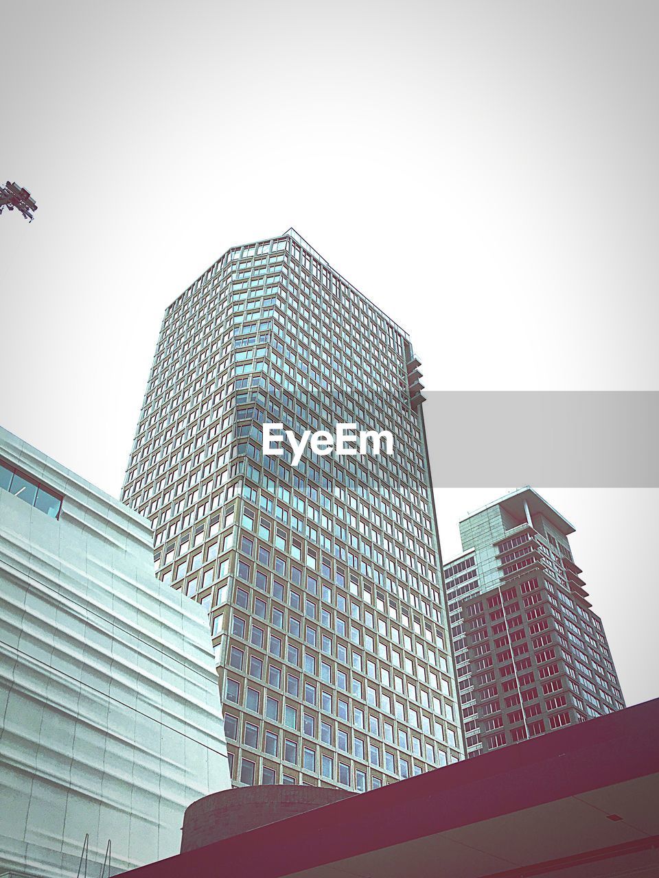 LOW ANGLE VIEW OF SKYSCRAPERS AGAINST CLEAR SKY