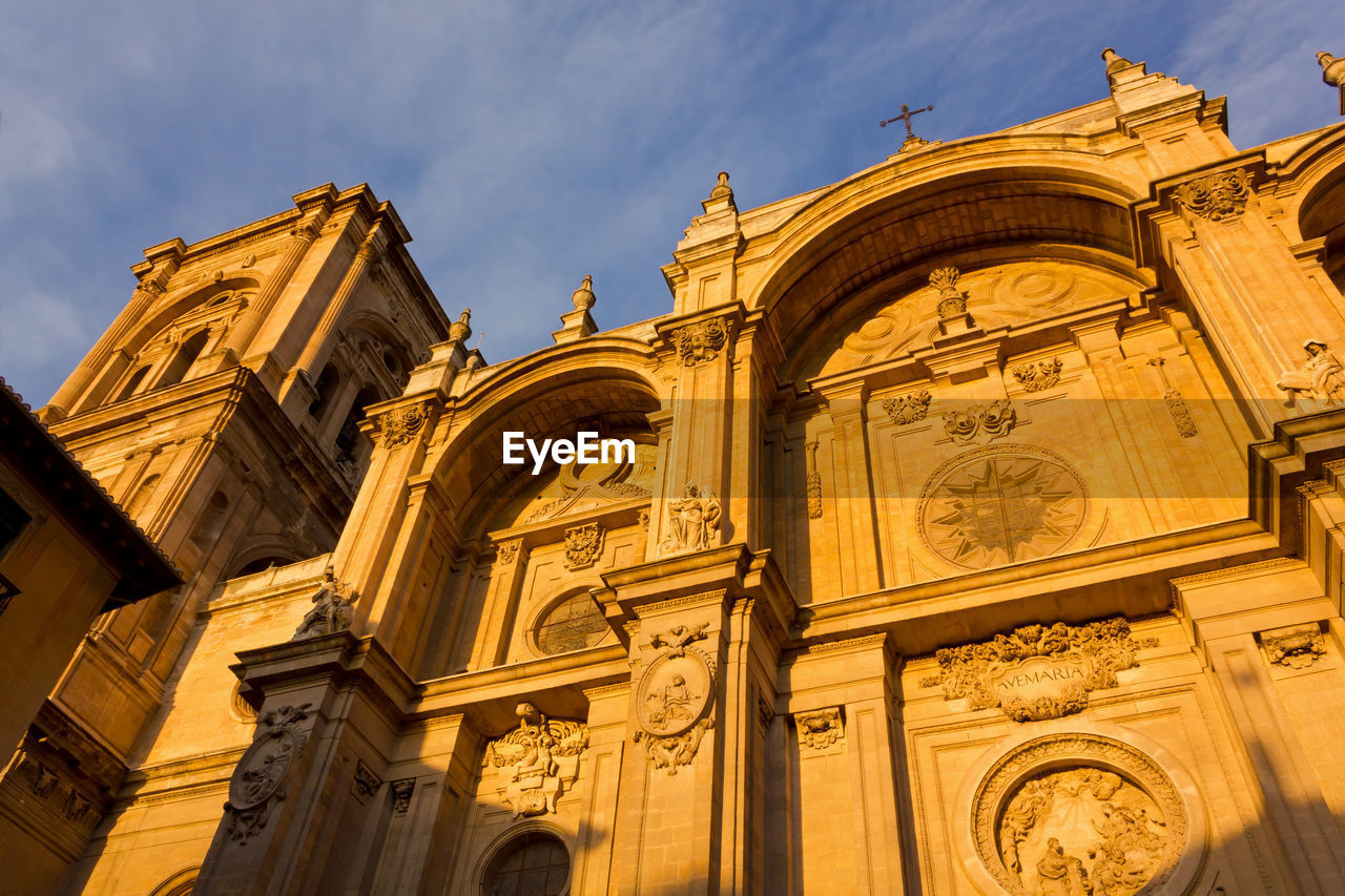 Low angle view of historical church against sky