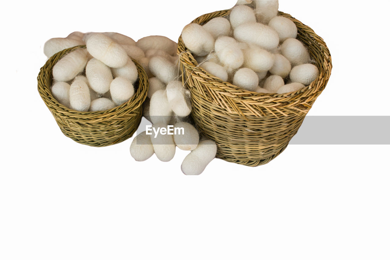 basket, food and drink, food, healthy eating, wellbeing, container, white background, studio shot, freshness, cut out, produce, indoors, wicker, no people, still life, vegetable, organic, raw food, group of objects, group