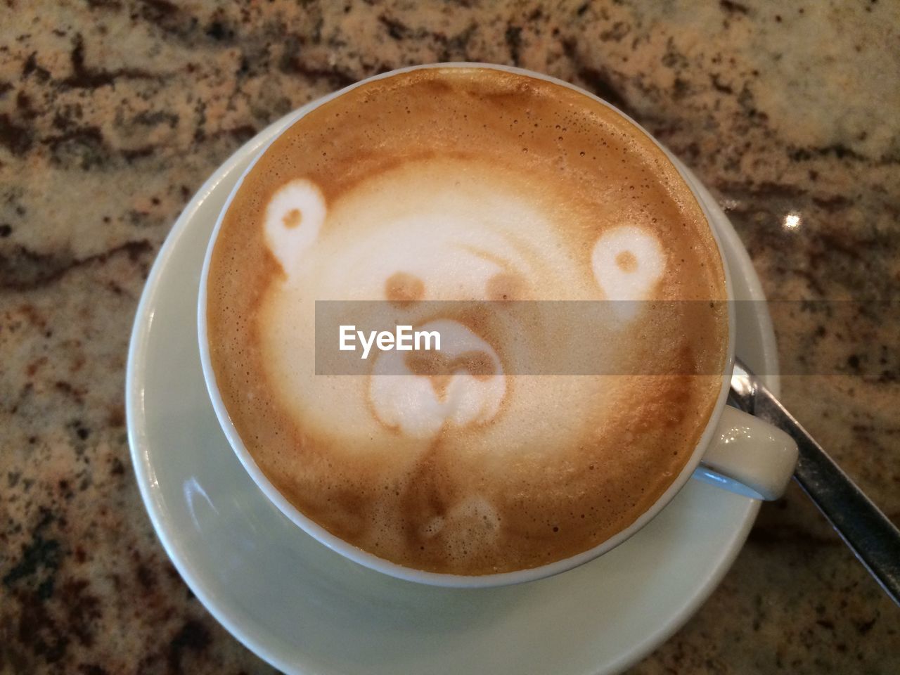 CLOSE-UP OF COFFEE CUP WITH COFFEE CUP