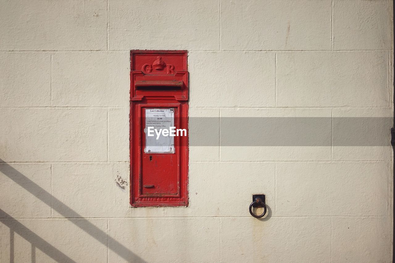 Postbox in wall