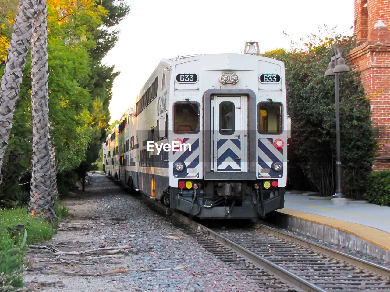 TRAIN ON RAILROAD TRACKS