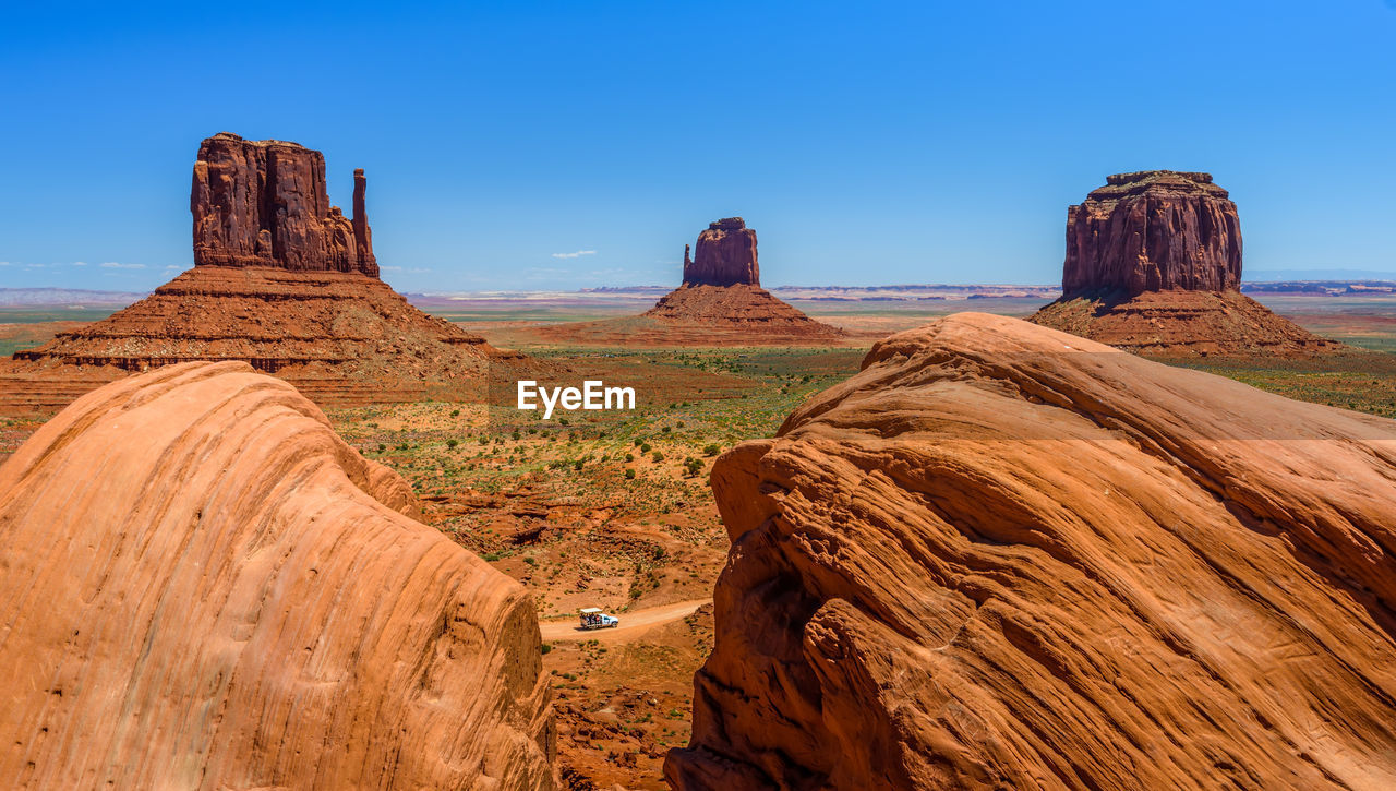 Panoramic view of rock formations against sky