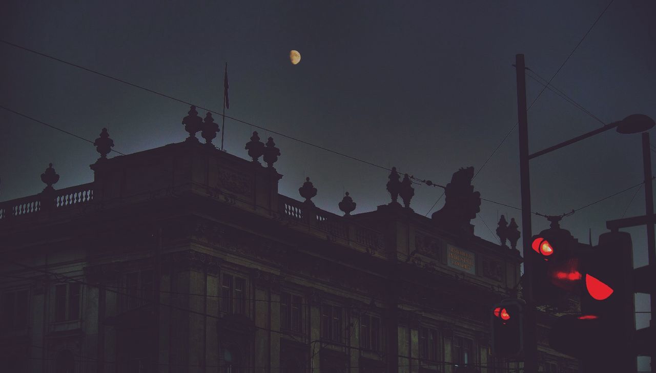 LOW ANGLE VIEW OF STREET LIGHT AGAINST SKY