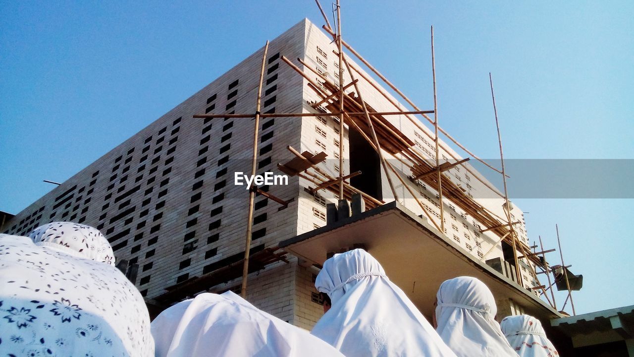 LOW ANGLE VIEW OF BUILDINGS