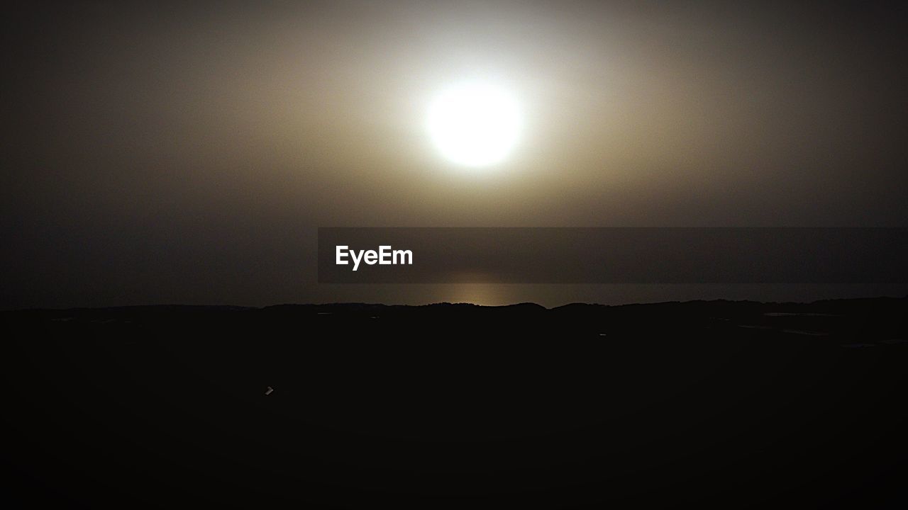 Scenic view of landscape at sunset