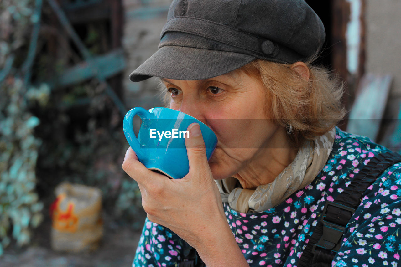 Senior woman drinking coffee