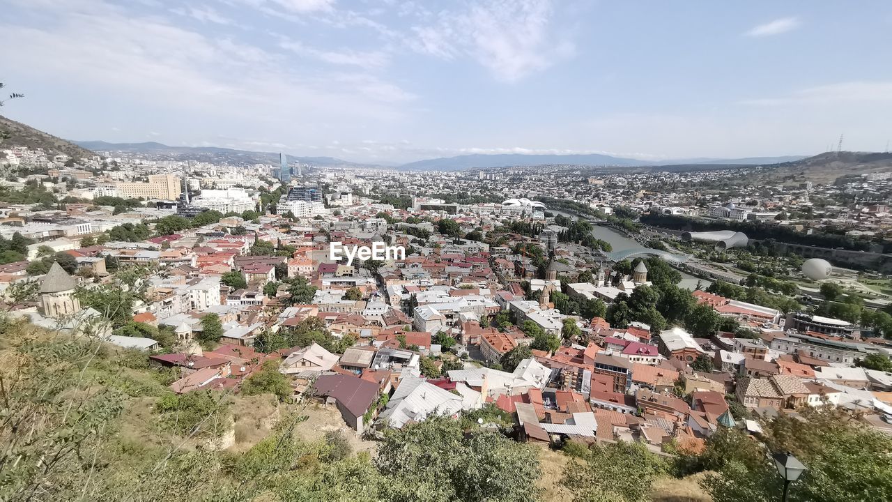 High angle shot of townscape against sky