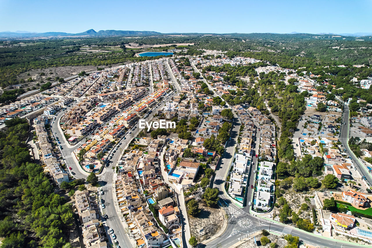 aerial view of cityscape against sky