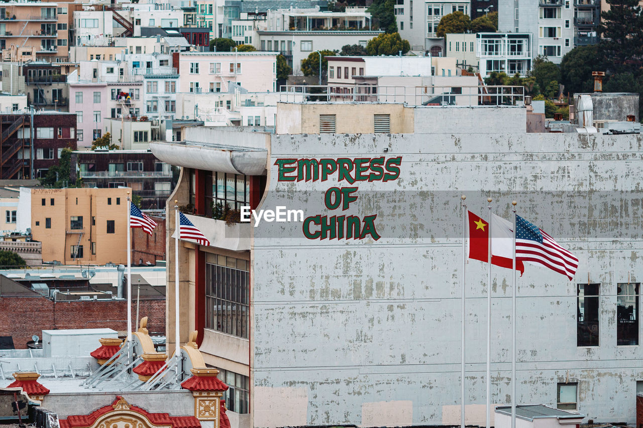 FLAG AGAINST BUILDINGS IN CITY