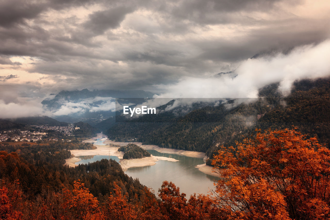 Scenic view of lake against sky during autumn