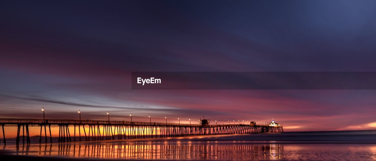 Scenic view of sea against sky at sunset