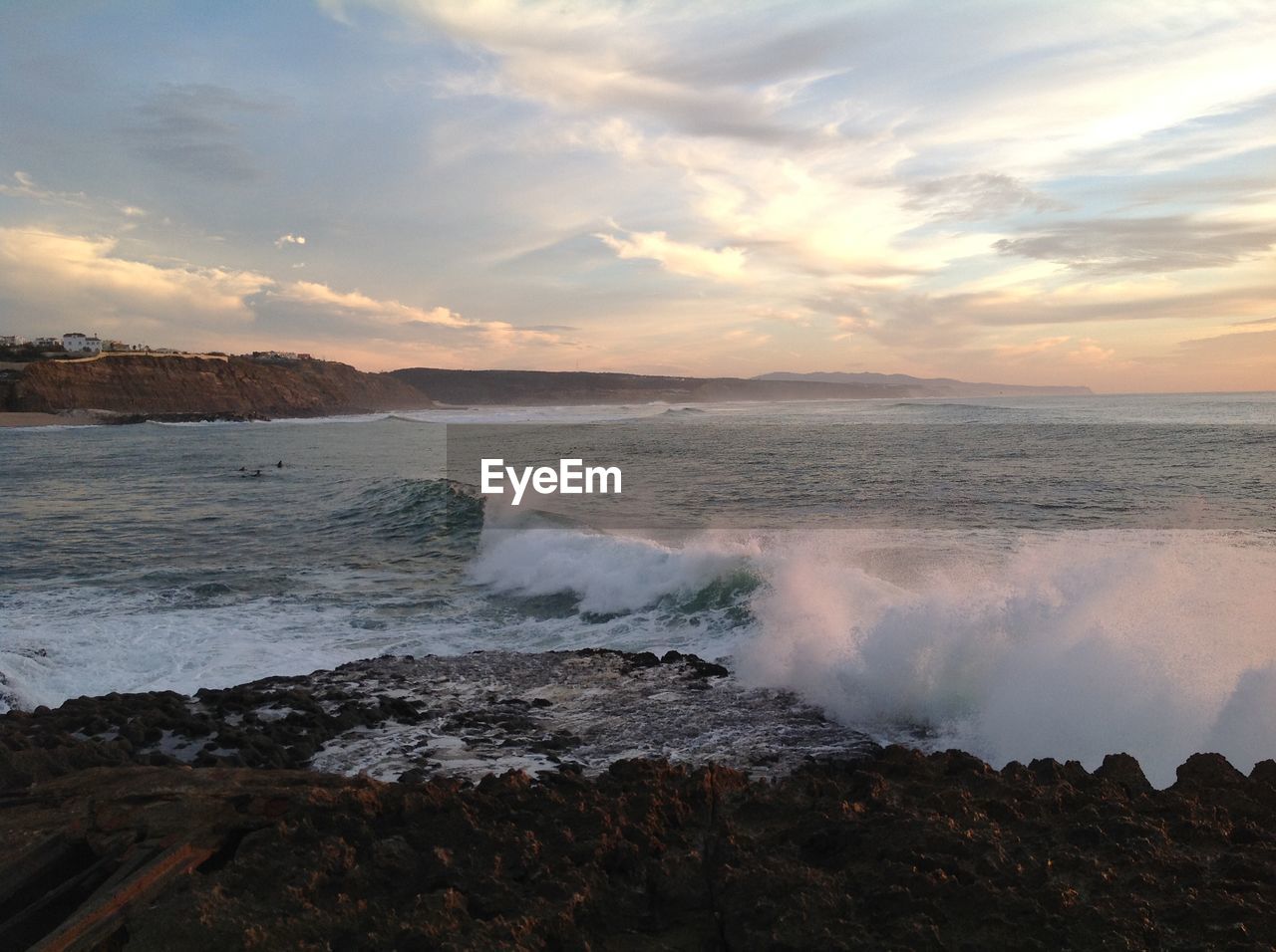 Scenic view of sea against dramatic sky