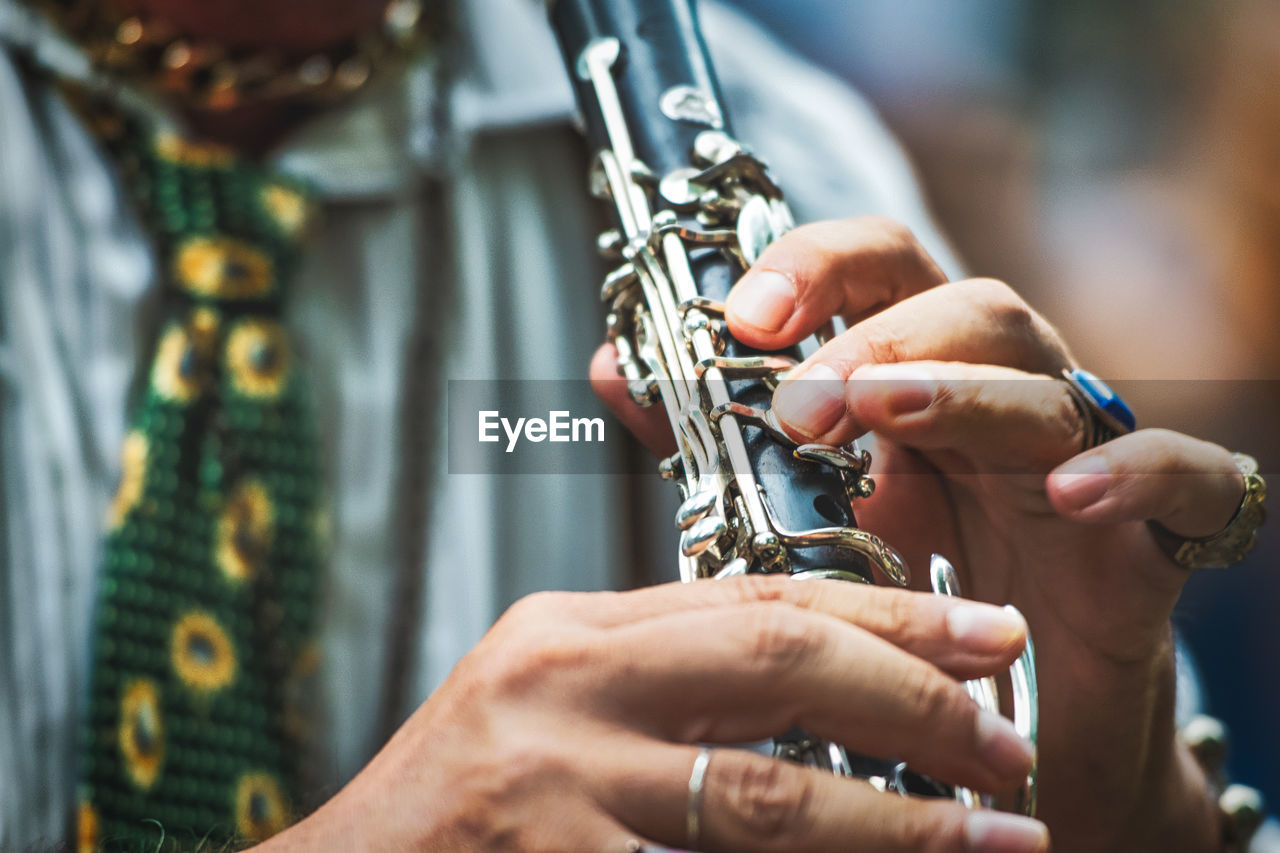 Detail of a musician clarinetist in the street