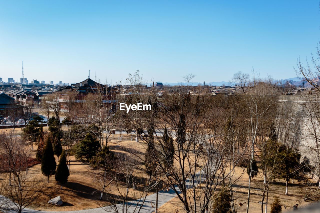 VIEW OF CITYSCAPE AGAINST CLEAR SKY