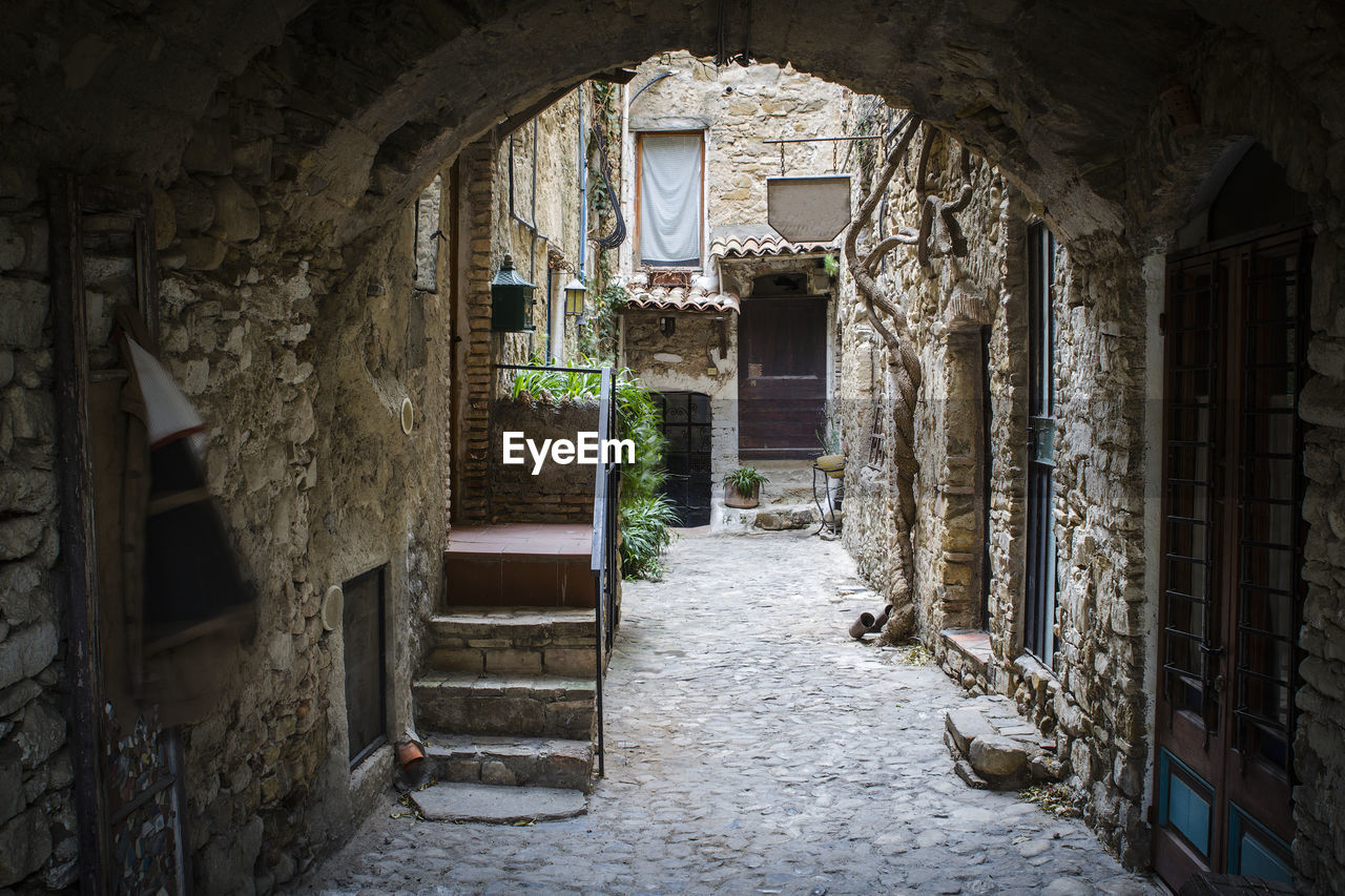 ALLEY AMIDST OLD BUILDING