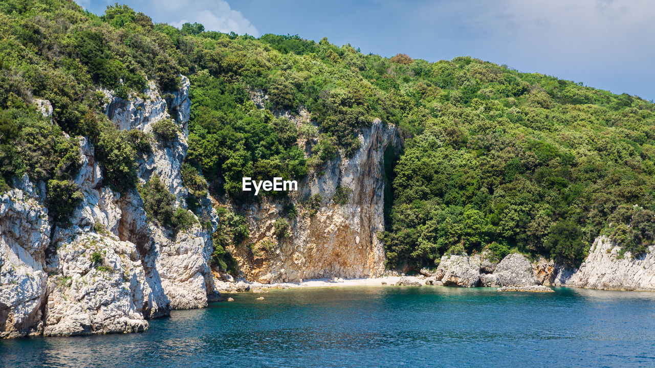 View of a cliff on croatia's coast from the sea.