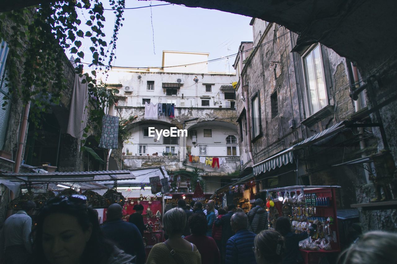 CROWD ON STREET IN CITY