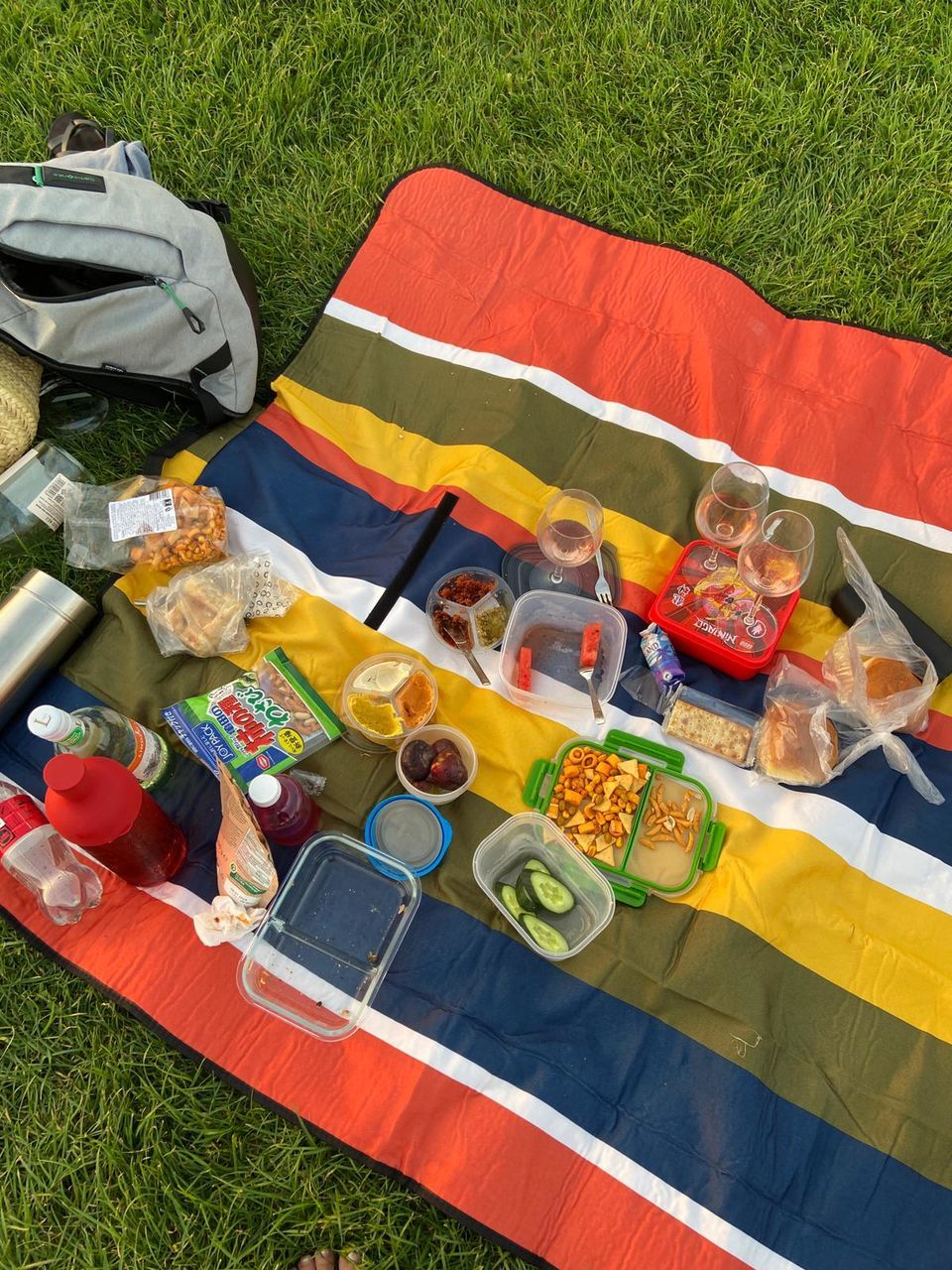 picnic, grass, food and drink, high angle view, food, picnic blanket, healthy eating, plant, day, nature, summer, drink, no people, blanket, land, outdoors, vegetable, wellbeing, fruit, meal, lawn, multi colored, freshness, table, leisure activity, field, bread